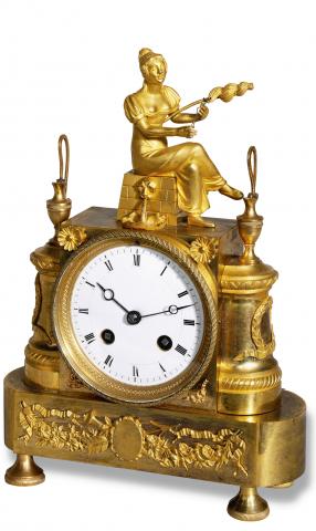 The Yarn Winder.Samuel Marti, Paris, No. 1676. Made circa 1900..Fine, small, Empire-style, gilt-bronze 8-day going mantel clock.with hour and half-hour striking.