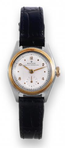 Rolex, Oyster Perpetual, case No. 670006, Ref. 5002/5003. Made in the early 1950's..Fine, self-winding, water-resistant, stainless steel and yellow gold lady's wristwatch with a gold-plated Rolex.buckle..To be sold without reserve