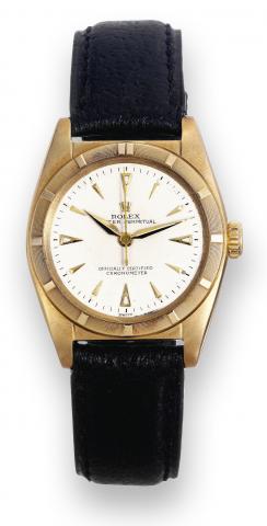 Bubble Back.Rolex, Oyster Perpetual, Officially Certified Chronometer, case No. 656357, Ref. 6011. Made in 1949..Fine and rare, tonneau-shaped, center-seconds, self-winding, water-resistant, 14K yellow gold wristwatch.