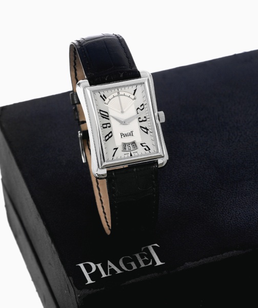 Emperador Retrograde Seconds.Piaget, Emperador, case No. 909350.Ref. P 10108. Made circa 2004..Fine, rectangular flared, water-resistant, self-winding, 18K.white gold wristwatch with retrograde seconds, date and an.18K white gold Piaget buckle. Accompanie