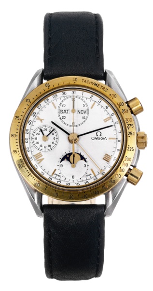 Triple Date Moon Phase.Omega, Speedmaster, case No. 51523268.Ref. 1750034. Made in the 1990's..Fine, self-winding, stainless steel and 18K yellow gold.wristwatch with round button chronograph, registers and.tachometer, 24-hour indication, triple date and 