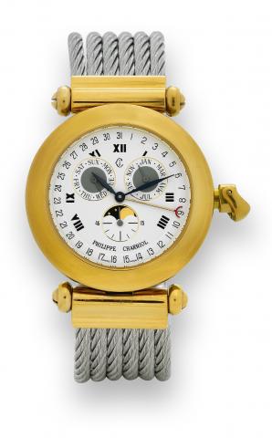 Charriol Triple Date Quartz.Philippe Charriol, Christopher Columbus, Ref. 38.93.135. Made in the late 1990's..Fine, gold-plated and stainless steel wristwatch with triple date, moon phases and a Charriol woven metal.strap with steel clasp. Accompanied by 