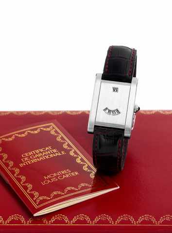 Cartier's platinum Anniversary.Cartier, Paris, Tank a guichet, No. 070/150. Made in a limited edition of 150 pieces to celebrate.the 150th anniversary of Cartier in 1997..Very fine, very rare and elegant, rectangular, platinum digital wristwatch with an 1