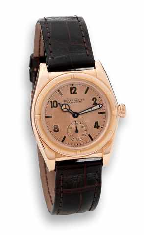 Rolex Yellow Gold Bubble Back.Rolex Oyster Perpetual, Officially Certified Chronometer.Ref. 3458. Made circa 1947..Fine and rare, tonneau shaped, self-winding, water-resistant.18K yellow gold chronometer wristwatch with an 18K yellow.gold Rolex buckle.