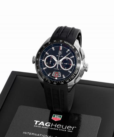 Tag Heuer SLR.Tag Heuer, SLR, For Mercedes-Benz, Automatic, case.No. EEG3842, Ref. CAG2010. Sold on December 15th, 2009..Fine and unusual, large curved, water-resistant, stainless.steel wristwatch with square button chronograph, registers.date and a stain