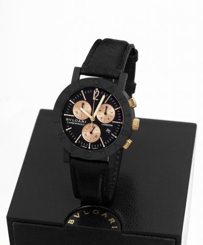 Bulgari Carbongold London.Chronograph.Bulgari, Carbongold London, No. 503/999, Ref..BB38CLCH. Made in a limited edition of 999 examples in.2007..Fine, water-resistant, carbon-fiber and gold quartz wristwatch.with oval-button chronograph, registers, date a