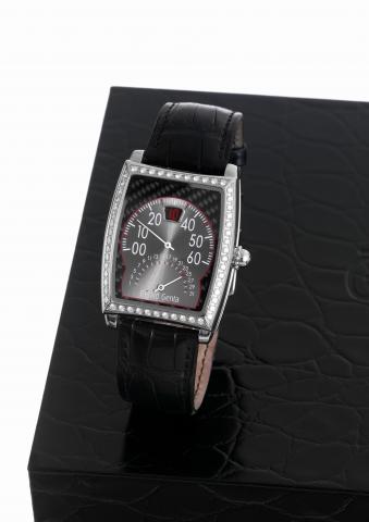 G_rald Genta Solo Bir_tro.G_rald Genta, Solo Bir_tro, case No. 115490.Ref. BSO.L.10. Made circa 2006..Fine, tonneau-shaped and curved, jump hour, self-winding.water-resistant, stainless steel and diamond wristwatch with.retrograde minutes and retrograde d