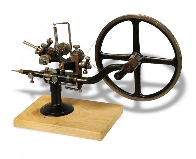 Rounding-Up Tool.Exa, retailed by Sandoz Fils Co., La.Chaux-de- Fonds Bienne, Swiss. Made.in the 20th century..Fine, painted steel rounding-up tool on.wooden base..To be sold without reserve