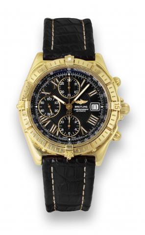 Breitling Yellow Gold crosswind.Breitling, Crosswind, Chronograph Automatic, No. 0027.Ref. K13055. Made circa 2000..Fine, self-winding, water-resistant, 18K yellow gold.chronometer wristwatch with round button chronograph.registers, tachometer, date and a