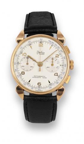 Dulcia, Suisse, Chronographe.Antimagnetic. Made in the.1940s..Fine and rare, large, anti-magnetic, 18K pink gold.wristwatch, square button chronograph.register, tachometer with cornes de.vache lugs.