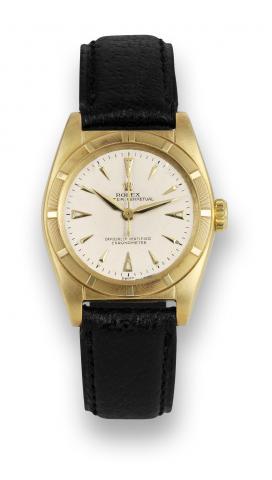 Rolex Bubble Back.Rolex, Oyster Perpetual, Officially.Certified Chronometer, case No..656357, Ref. 6011. Made in 1949..Fine and rare, tonneau-shaped, centerseconds.self-winding, water-resistant.14K yellow gold wristwatch..To be sold without reserve