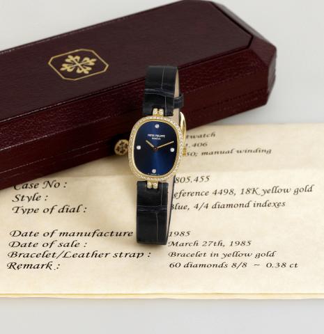 Patek Philippe Yellow Gold and Diamond.Ellipse.Patek Philippe, Geneve, movement No. 1411406, case No..2805455, Ref. 4498. Made in 1985, sold on March 27th, 1985..Very fine and elegant, oval, 18K yellow gold and diamonds.lady