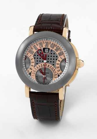 G_rald Genta Arena.QuattroRetro chronograph.G_rald Genta, Arena QuattroRetro, case No. 122327.Ref. ABC.Y.55. Made circa 2007..Fine, center seconds, self-winding, water-resistant.chronograph jump hour 18k pink gold and tantalum.wristwatch with retrograde m