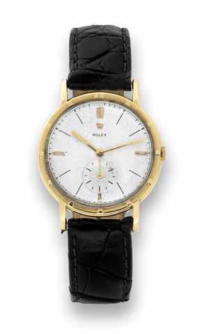 Rolex, Ref. 4325, Metropolitan.Rolex, Officially Certified Chronometer, Ref. 4325. Made in.the 1940s..Fine and rare, 18K yellow gold wristwatch..To be sold without reserve