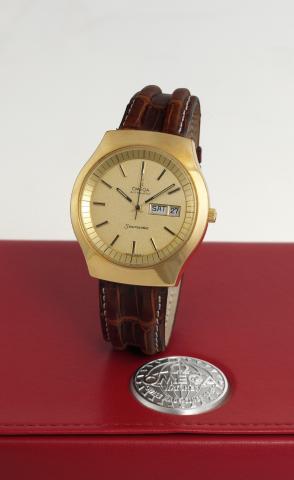 Omega Seamaster Ref. 1660223.Omega, Seamaster, Automatic, movement No. 39060077.Ref. 1660223. Made circa 1975..Fine, cushion shaped, self-winding, center seconds, water.resistant, stainless steel and gold plated wristwatch with.day-date, a gold plated Ome