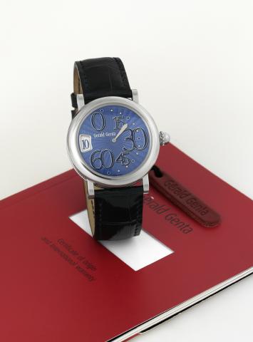 Gerald Genta Retro Classic.Gerald Genta, Retro Classic, No..104700, Ref. REC.L.10. Made circa 2000..Fine and unusual, stainless steel, waterresistant.self-winding, wristwatch with.jump-hours, retrograde minutes and.a stainless steel Gerald Genta buckle..A