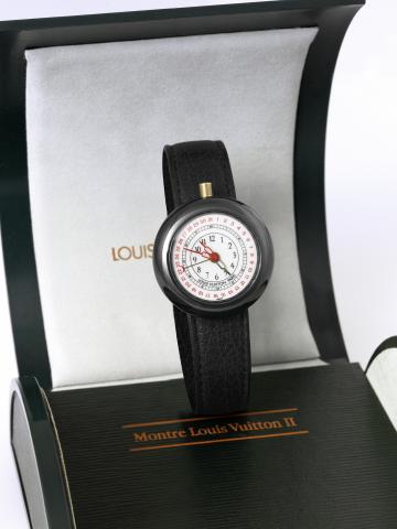 IWC Louis Vuitton Ceramic Alarm.Louis Vuitton, Paris, Ceramic Alarm, Ref. 3100, case No. 2415540. Made in 1998..Fine, ceramic quartz wristwatch with alarm, date and a gold-plated Louis Vuitton buckle. Accompanied by a fitted box and.certificate.