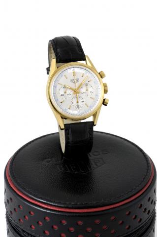 Heuer Carrera Chronograph.Heuer, Carrera, 1964 re-edition, movement No. 4503475.case No. 0318, Ref. CS3140. Made in a numbered series circa.2000..Fine, water-resistant, 18K yellow gold wristwatch with round.button chronograph, registers and a Heuer 18K ye