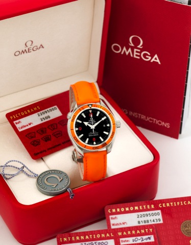 OMEGA PLANET OCEAN CO-AXIAL.Omega Planet Ocean Orange Co-Axial, Chronometer.600m/ 2000ft, No. 81881439, Ref. 22095000. Sold on.October 2, 2008..Fine, center seconds, self-winding, water-resistant, stainless.steel diver