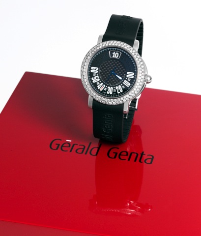 Steel and Diamond Retro Sport.G_rald Genta, Retro Sport, case No. 93294, Ref. G3694..Made in the late 1990s..Fine, jump-hour, center-seconds, self-winding, water-resistant.stainless steel and diamond wristwatch with retrograde.minutes and a black rubber s