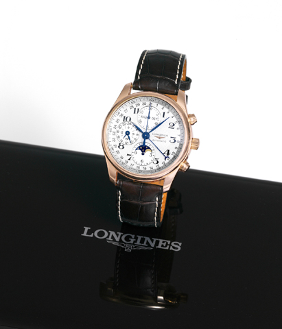 Longines, Master Collection, Automatic, case.No. 33882590, Ref. 26738783. Sold in April 17th, 2008..Very fine, self-winding, water resistant, 18K pink gold.wristwatch, round button chronograph, registers, 24-hour.indication, triple date calendar, moon pha