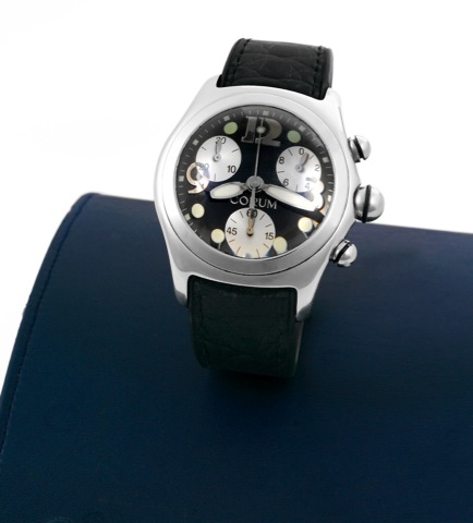 Corum Bubble.Chronograph.Corum, Bubble Chronograph.case No. 710852, Ref. 396. 150.20..Made circa 2000..Fine and unusual, curved, water-resistant.stainless steel quartz wristwatch with.date, round button chronograph.registers, thick domed crystal creating 