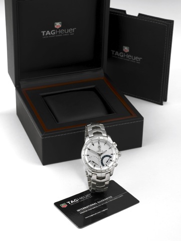TAG HEUER LINK CALIBRE S.Tag Heuer, Swiss, Link Calibre S, Ref.CJF7111. No.REN0002. Made in 2010..Fine, quartz, water-resistant, stainless steel perpetual calendar wristwatch with square button chronograph, tachymeter scale, dual retrograde scales for rec