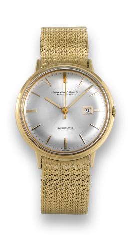 International WatCh Co..International Watch Co., (IWC).Schaffhausen, Automatic, movement.No. 1696059, case No. 1700671, Ref..603. Made in the 1960s..Very fine, self-winding (Pellaton system).center seconds, 18K yellow gold.wristwatch with date and an 