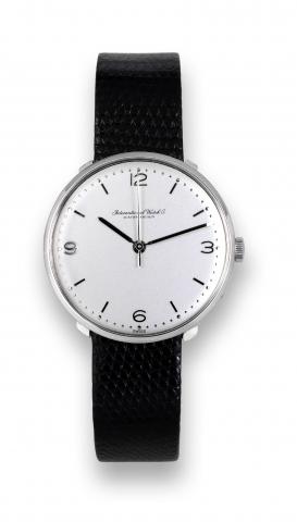 White Gold So-Called Disco.volante.International Watch Co., (IWC).Schaffhausen, movement No. 1572938.case No. 1626021, Ref. 1210. Made in.the late 1950s..Fine and rare, center seconds,18K white.gold wristwatch.