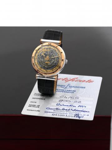 Ulysse Nardin - Planetarium Copernicus.Ulysse Nardin, Le Locle, Suisse, Planetarium Copernicus.No. 24/65, Ref. 800-22. Made in limited edition of 65.examples in 1989, sold in 1994..Very fine and unusual, astronomic, self-winding, waterresistant.18K pink a