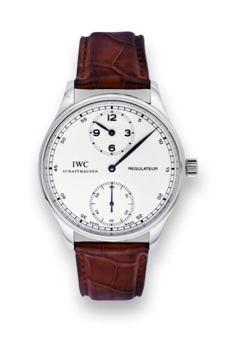 IWC Portuguese Steel Regulator.International Watch Co., Schaffhausen, Portuguese.Regulateur, Chronometerwerke, movement No. 2672377.case No. 3235256, Ref. 5443. Made in 2005..Fine, large, water-resistant, stainless steel wristwatch with.regulator dial and