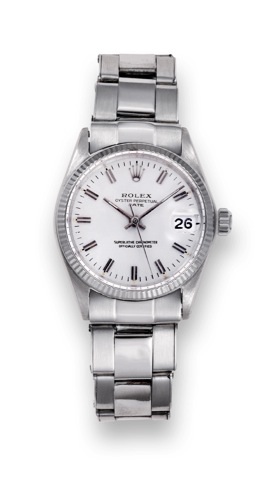 Rolex Oyster 18K.Perpetual Date.Rolex, Oyster Perpetual Date.Ref. 6624, case No. 1591966..Produced in the early 1960s..Fine, center-seconds, self-winding.water-resistant, 18K white gold mid-size.wristwatch with date and an 18K white.gold Rolex bracelet.