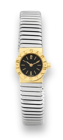 Bulgari, Ref. BB 19 2T. Sold on June 20, 1988..Fine, water-resistant, 18K yellow gold lady's quartz wristwatch with an integrated stainless steel and 18K yellow.gold Bulgari tubogaz bangle bracelet. Accompanied by original fitted box and guarantee..To be 