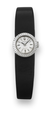 Rolex - White Gold - Orchid.Rolex, Orchid, case No. 2855640, Ref. 2059. Made in the 1960s..Fine and rare, 18K white gold lady's wristwatch. Case featuring a double bottomed back for insertion of straps.or bracelet. Accompanied by 3 additional straps, blue