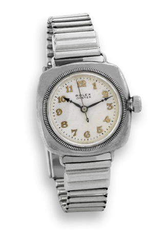 Rolex Oyster - Cushion Case.Center Seconds.Rolex Oyster, Ref. 3537. Made in the late 1920's..Fine and unusual, cushion-shaped, center seconds.water-resistant, sterling silver wristwatch with a gold-filled.link bracelet.