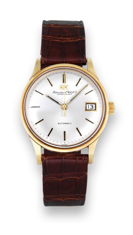 IWC _ Yellow Go ld Automat ic.International Watch Co., (IWC), Schaffhausen, Automatic,.movement No. 1896587, case No. 1758316, Ref..809A. Made circa 1968..Fine and very rare, 18K yellow gold, tonneau-shaped, center.seconds, self-winding with Pellaton syst