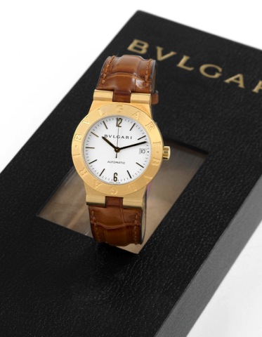 Bulgari - Yellow Gold - Automat ic.Bulgari, Automatic, case No. L 1022, Ref. LC.35.G..Made in the 1990s..Fine, center seconds, water-resistant, self-winding, 18K yellow.gold wristwatch with date and an 18K yellow gold Bulgari.buckle. Accompanied by the or