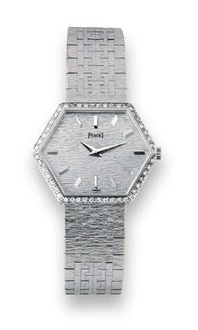 Piaget White Gold Diamonds.Piaget, case No. 304284, Ref. 95575 A6. Made in the 1970s..Fine, hexagonal, 18K white gold, lady's wristwatch with.diamond-set bezel and an integral 18K white gold Piaget.bracelet. Accompanied by a Piaget box.