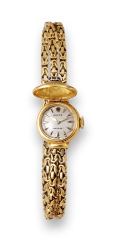 Rolex, Precision, case No. 50351, Ref. 8959..Made in the 1950s..Fine, 18K yellow gold lady's wristwatch with hinged cover set.with 1 brilliant-cut diamond, concealed dial and an 18K yellow.gold Rolex twisted link bracelet..To be sold without reserve