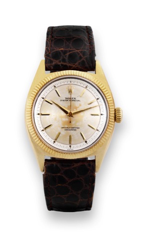 Rolex Ref. 6502 Yellow Gold.Rolex, Oyster Perpetual, Officially Certified Chronometer.case No. 36759, Ref. 6502. Made in 1957..Very fine and rare, tonneau-shaped, center-seconds, selfwinding.water-resistant, 18K yellow gold wristwatch with.an 18K Rolex bu