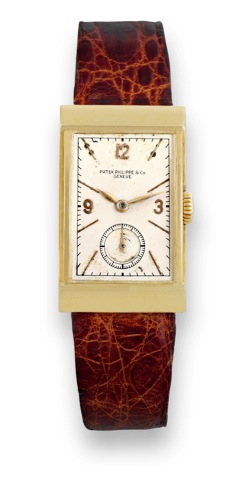 Patek Philippe, Yellow Gold, Ref. 528..Patek Philippe Co., Geneve, movement No. 833.215.case No. 619.249, Ref. 528. Made in 1939..Very fine and rare, rectangular, curved, 18K yellow gold.wristwatch with a 18K yellow gold Patek Philippe buckle..Accompani