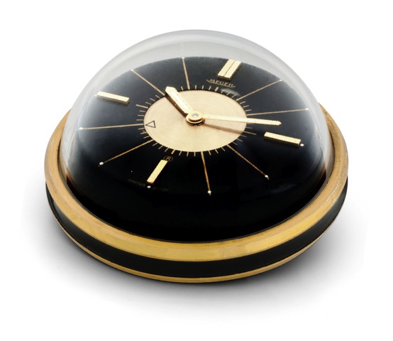 Jaeger Memovox Desk Alarm Clock.Jaeger, Memovox. Made in the 1960s..Fine, gilt-brass and Perspex, 8-day going desk clock with alarm.