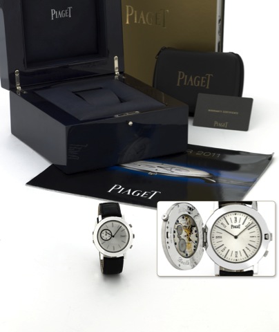 Piaget - White Gold - Altiplano - Double Play.Piaget, Altiplano M_canique Double Jeu, case No. 1022081, Ref. P10665..Made circa 2008, sold July 21st, 2010..Very fine, rare and unusual, two time zone, two thin 18K white gold.wristwatches back on back with 