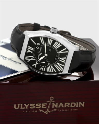 Ulysse Nardin - White Gold.Ludo vico Perpetual.Ulysse Nardin, Ludovico Perpetual Calendar, No. 096.Ref. 330-48. Made circa 2004..Fine, tonneau-shaped, curved, self-winding, water-resistant.18K white gold wristwatch with perpetual calendar and an.18K white