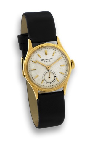 Patek Philippe - Ref. 2451 - Yellow Gold.Calatrava.Patek Philippe, Geneve, No. 740230, case No. 676709.Ref. 2451. Made in 1953..Fine, water-resistant, 18K yellow gold wristwatch.