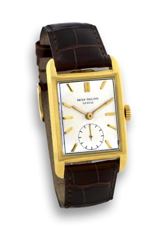 Patek Philippe - Ref. 2434 - Yellow Gold.Patek Philippe Cie, Geneve, No. 973908, case No. 666255.Ref. 2434. Made circa 1951..Fine and rare, rectangular, 18K yellow wristwatch.