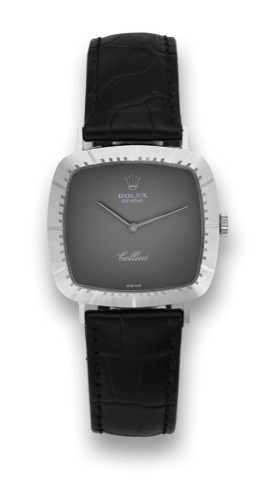 Rolex Cellini, Ref. 4084..Rolex Cellini, Ref. 4084. Case No. 4368437, Produced.in the 1970's..Fine, cushion-shaped, 18K white gold wristwatch with a.stainless steel Rolex buckle.