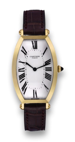 Cartier, Yellow Gold Tonneau Cintr_e.Cartier Paris, Tonneau Cintr_e, No. 0179 AF, Ref. 2458 B..Made circa 2000..Fine, tonneau-shaped, curved 18K yellow gold wristwatch.with an 18K yellow gold Cartier deployant clasp.