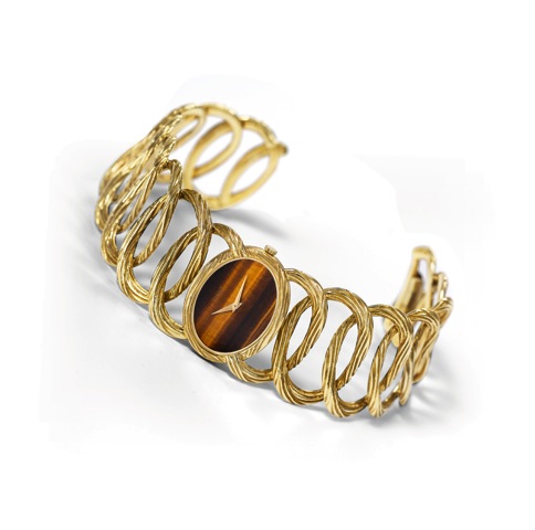 Piaget - Yellow Gold - Tiger Eye Dial.Piaget, case No. 180997, Ref. 9852 D65. Made in the 1980's..Very fine and elegant, 18K yellow gold lady