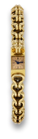Piaget Gold Baguette.Back-Winder.Piaget, Gold Baguette Duo-plan.Movement. No. 657267, case No..115936, Ref. 1011 N 31. Made in the.1950's..Very fine, very small and elegant.rectangular, 18K yellow gold lady's.wristwatch with an integral 18K yellow.gold ar
